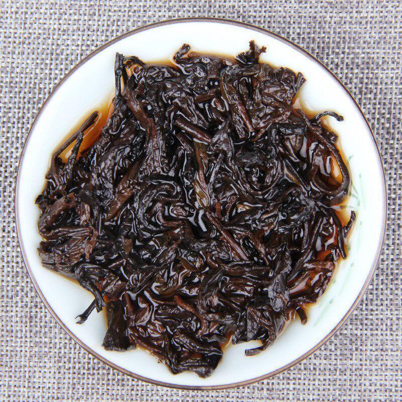 188g Ripe Yunnan Puer Menghai Tea Iron Puerh Made of Early Spring Tender Buds