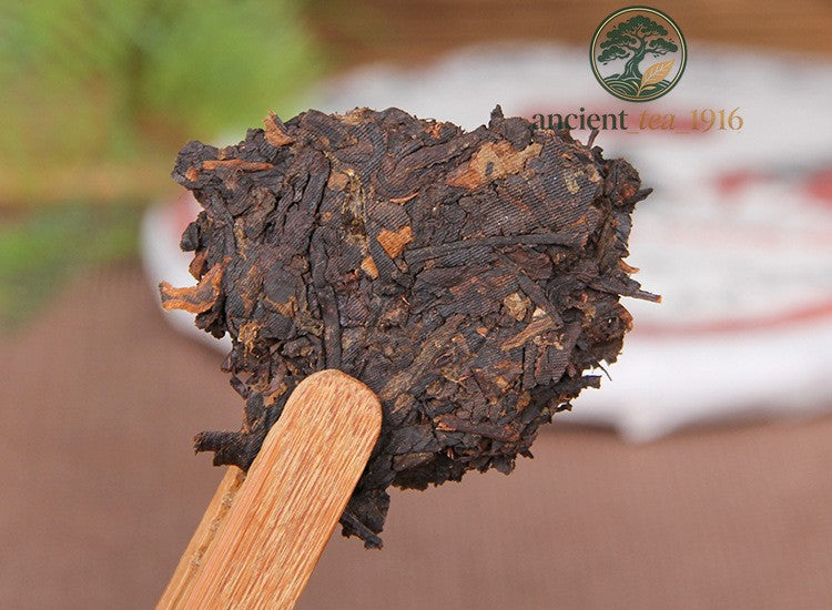 357g 2017 Pu'er Menghai Nannuoshan Qizi Tea Cake Ripe Tea Pu'er