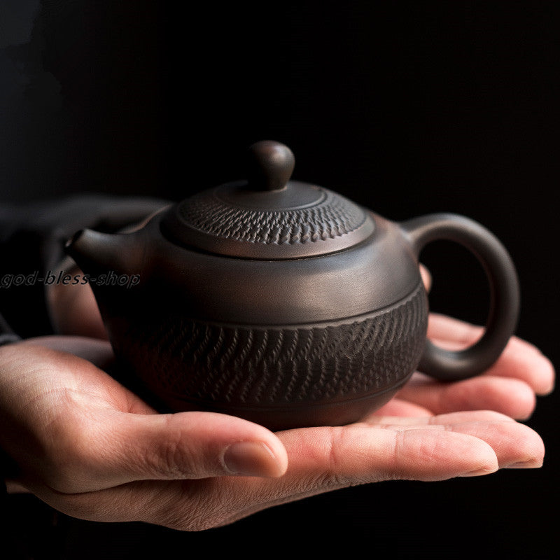 China JianShui Purple Pottery Tea Pot Creative Handmade Pot Xishi Ball Infuser