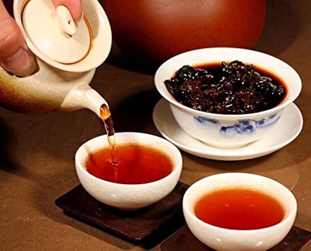 Yunnan Ancient Tree Tea Cooked Pu'er Tea 357g Banzhang Wang Menghai Qizi Cake