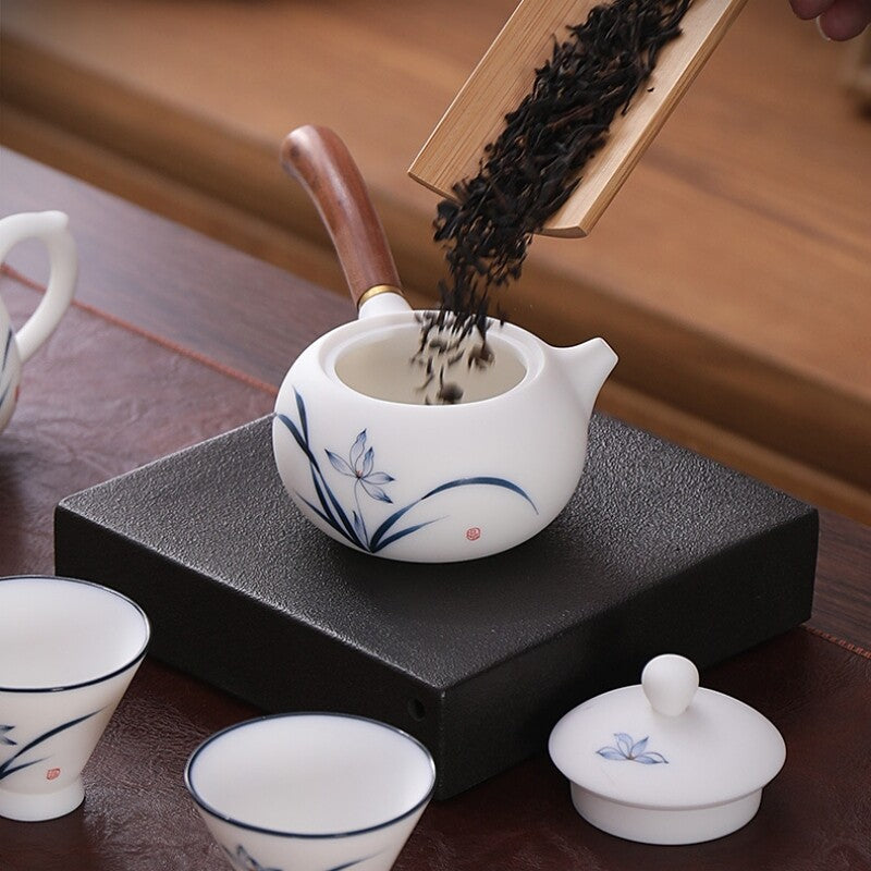 Boutique Fat Mutton Jade Porcelain Tea Set Hand Drawing Orchid Tea Pot Pitcher