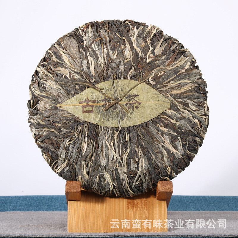 357g Yunnan Pu'er tea leaves Menghai Da Shu tea Putzi tea cake Pu'er raw tea