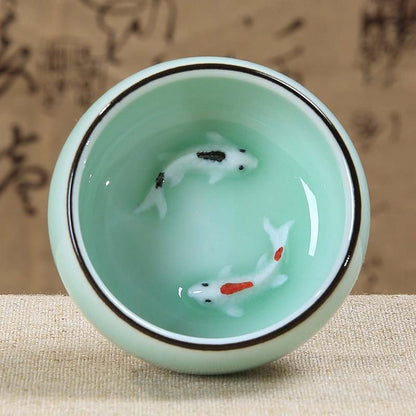 1pc Chinese celadon tea cup fish carved porcelain couple lover cup of tea