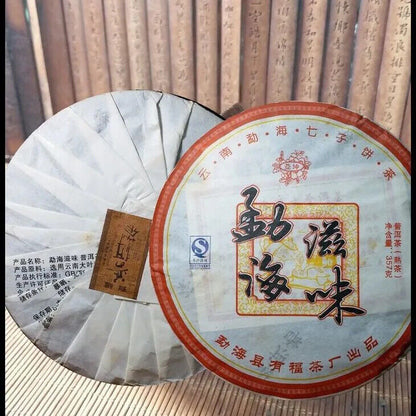Yunnan Aromatisierter Pu'er Kuchentee Qizi Kuchentee Menghai Reifer Tee 357g