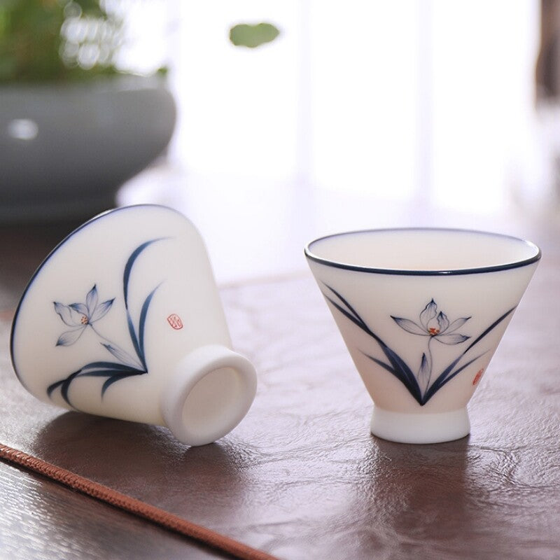 Boutique Fat Mutton Jade Porcelain Tea Set Hand Drawing Orchid Tea Pot Pitcher