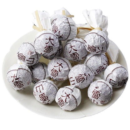 500g Yunnan Lincang Daxueshan Pu'er tea ripe tea ancient dragon pearl tea ripe