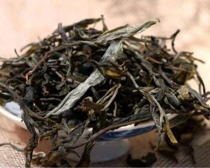 Yunnan Tea Nannuo Mountain Pema Ancient Tree First Spring Pu'er Raw Tea 100g