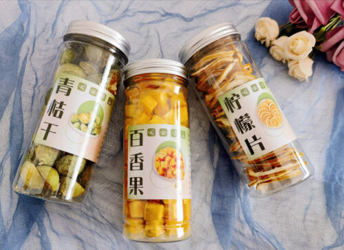 Green orange lemon passion fruit tea kumquat slices summer cold brew tea bottle