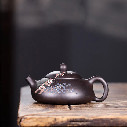 tea pot with ball shaped infuser holes handmade floral relief Chinese character marked pot original ore real yixing zisha clay