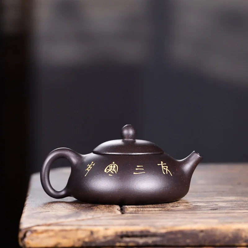 tea pot with ball shaped infuser holes handmade floral relief Chinese character marked pot original ore real yixing zisha clay