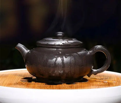 true yixing zisha tea pot marked full handmade ball shaped infuser holes pot of tea black galaxy clay original ore tea cup China