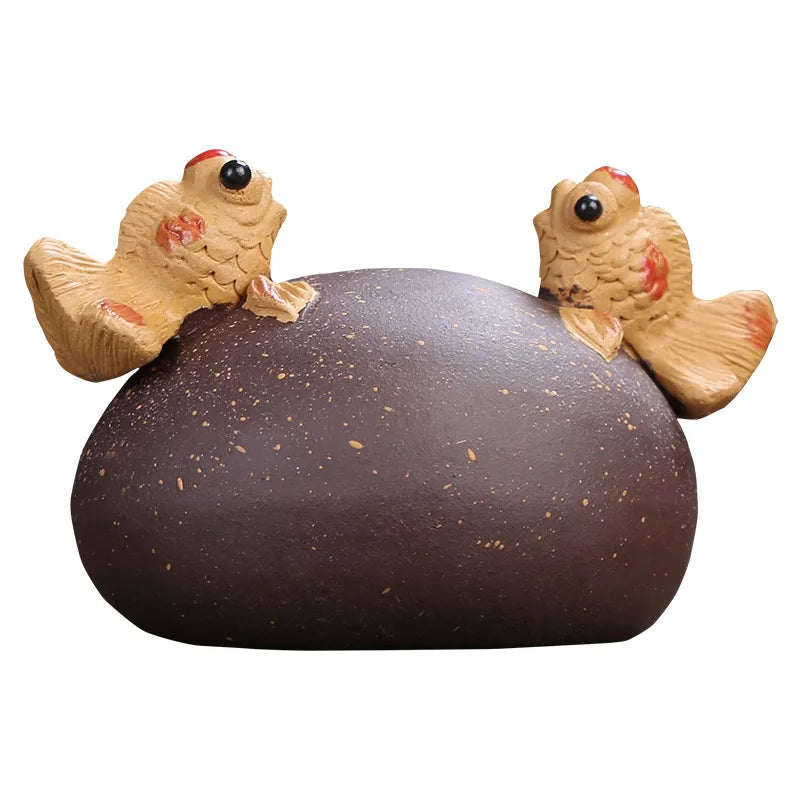 water squirt tea pet yixing zisha purple clay tea play golden fish playing on the stone house decoration handmade ornament China