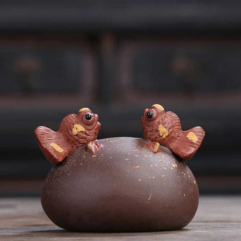 water squirt tea pet yixing zisha purple clay tea play golden fish playing on the stone house decoration handmade ornament China