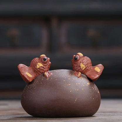 water squirt tea pet yixing zisha purple clay tea play golden fish playing on the stone house decoration handmade ornament China
